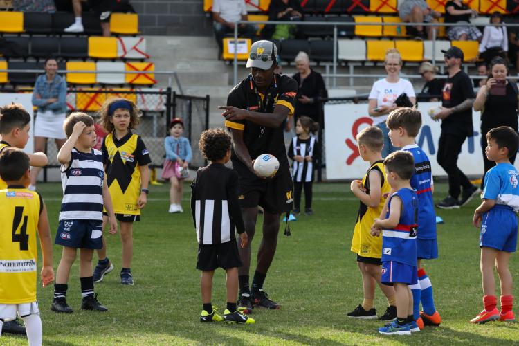 Werribee player with kids