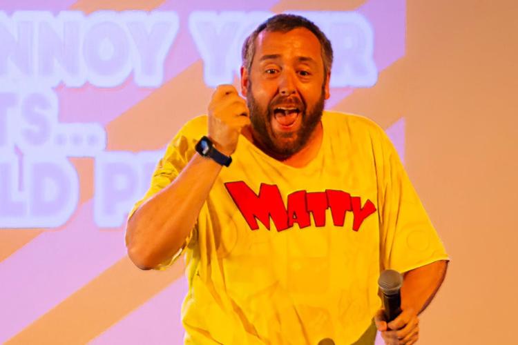 Performer wearing yellow top