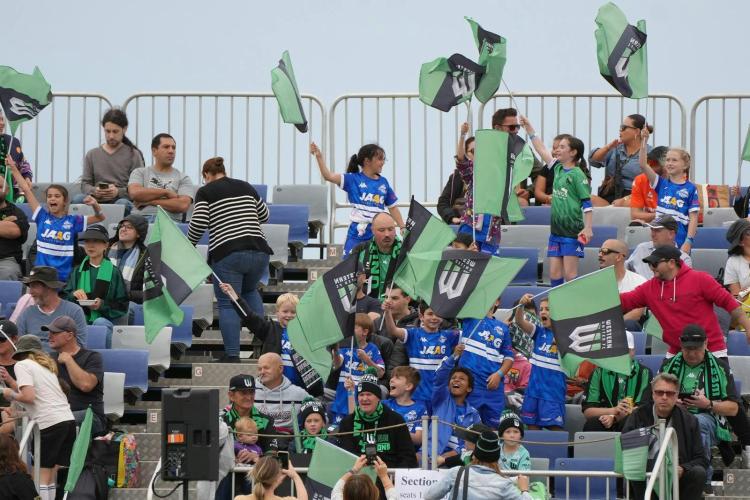 Western United fans cheering on the team