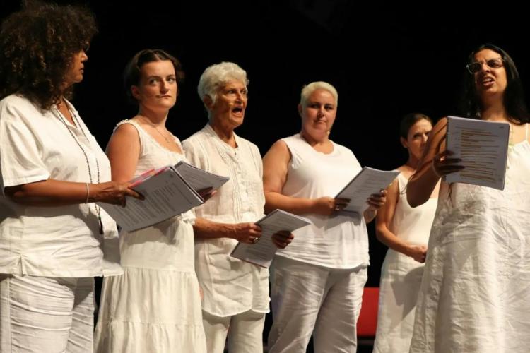 women performing on stage